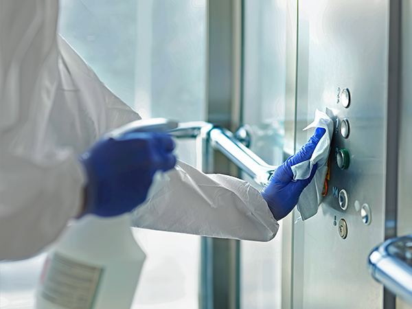 Cleaning elevator buttons
