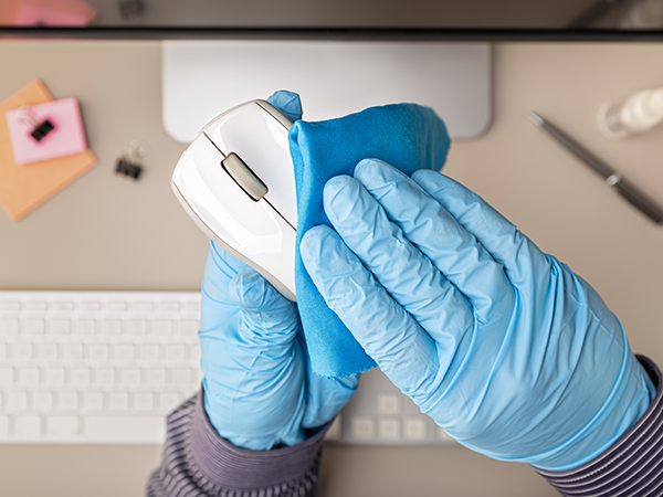 Disinfecting a computer mouse